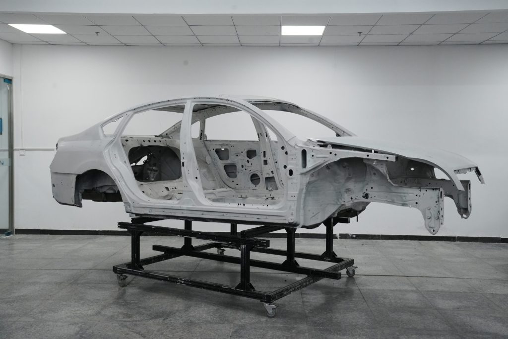 Body in white, refers to the stage in automotive manufacturing where a car's sheet metal components are assembled but not yet painted or trimmed.